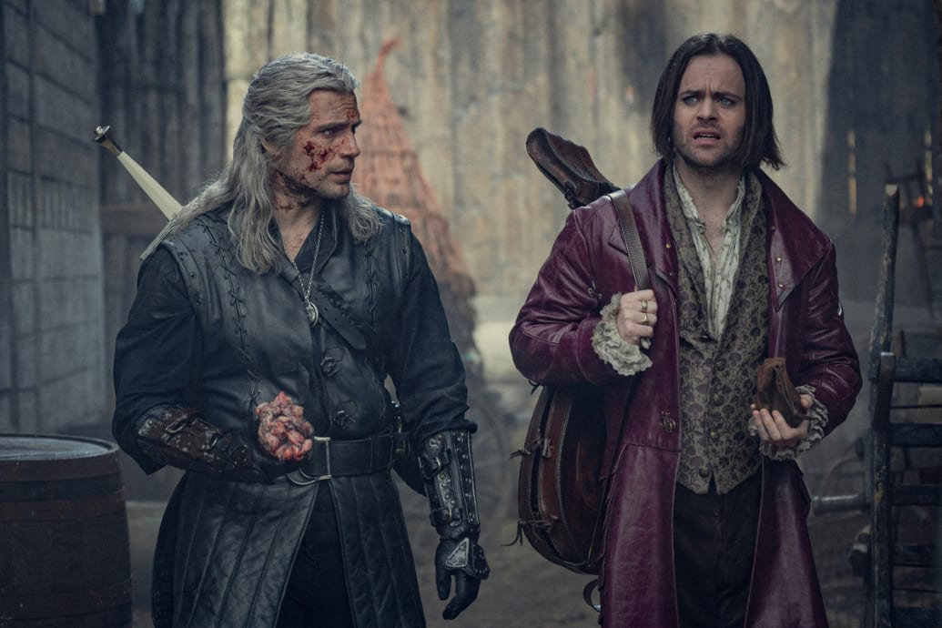 Still of Henry Cavill and a costar in The Witcher.