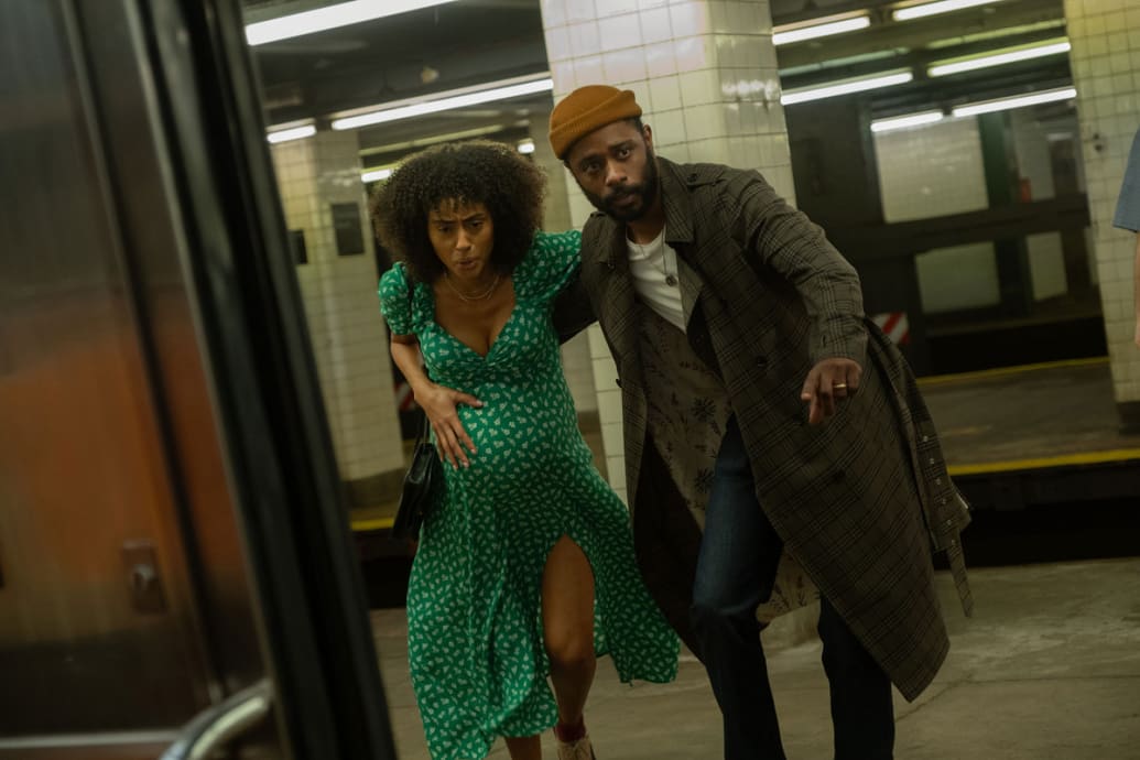 A still from ‘The Changeling’ shows Clark Backo and LaKeith Stanfield running to get on a subway train