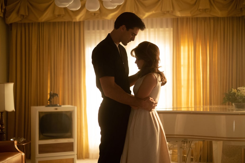 A picture of Cailee Spaeny and Jacob Elordi hugging in a still from  ‘Priscilla’