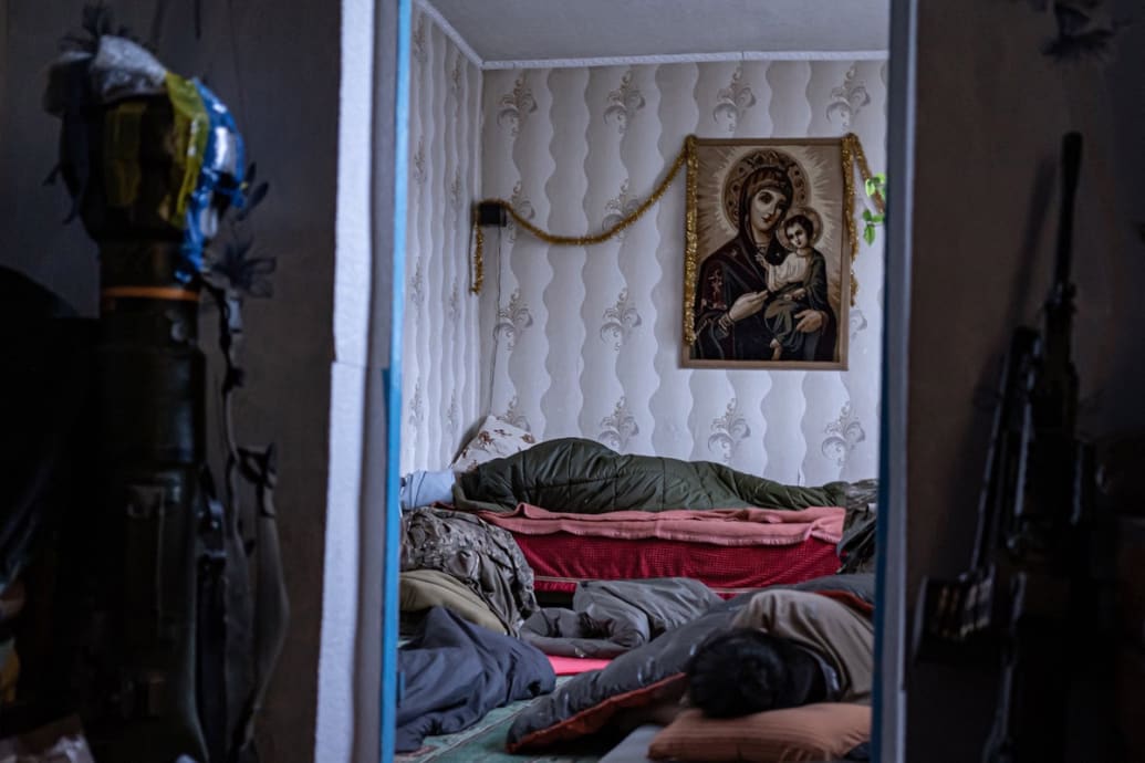 Men sleep as they recover from fighting in Ukraine after Russia’s invasion.