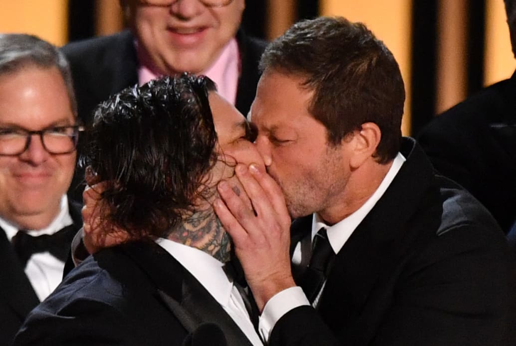 Ebon Moss-Bachrach kissing Matty Matheson at the Emmy Awards