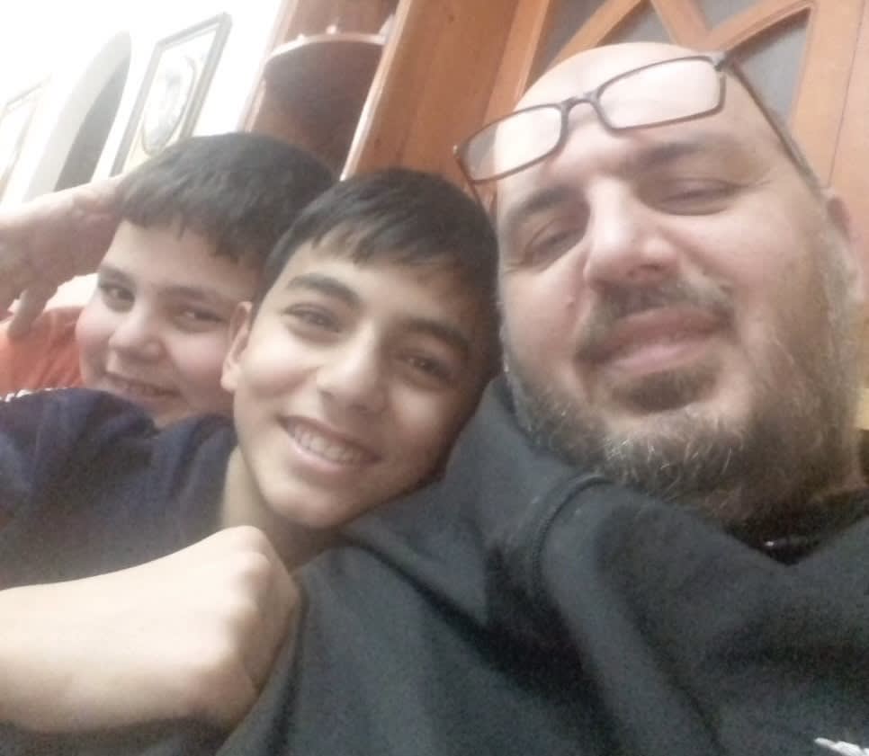 Ismail Abu Shaaban with two sons, Ibraheem, 13, and Husam Eldin, 16.