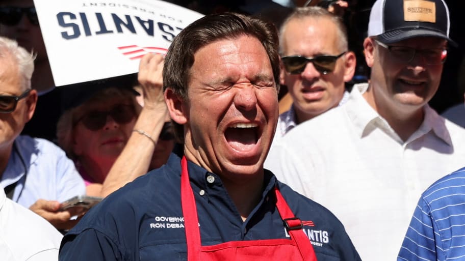 A picture of Republican U.S. presidential candidate and Florida Governor Ron DeSantis. DeSantis is getting endlessly trolled at the Iowa State Fair by hecklers, protestors, and even a plane flying overhead with a banner that read “Be likable, Ron!”