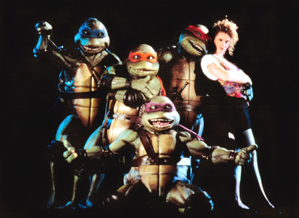 The turtles pose with Judith Hoag from the 1990 film ‘Teenage Mutant Ninja Turtles’