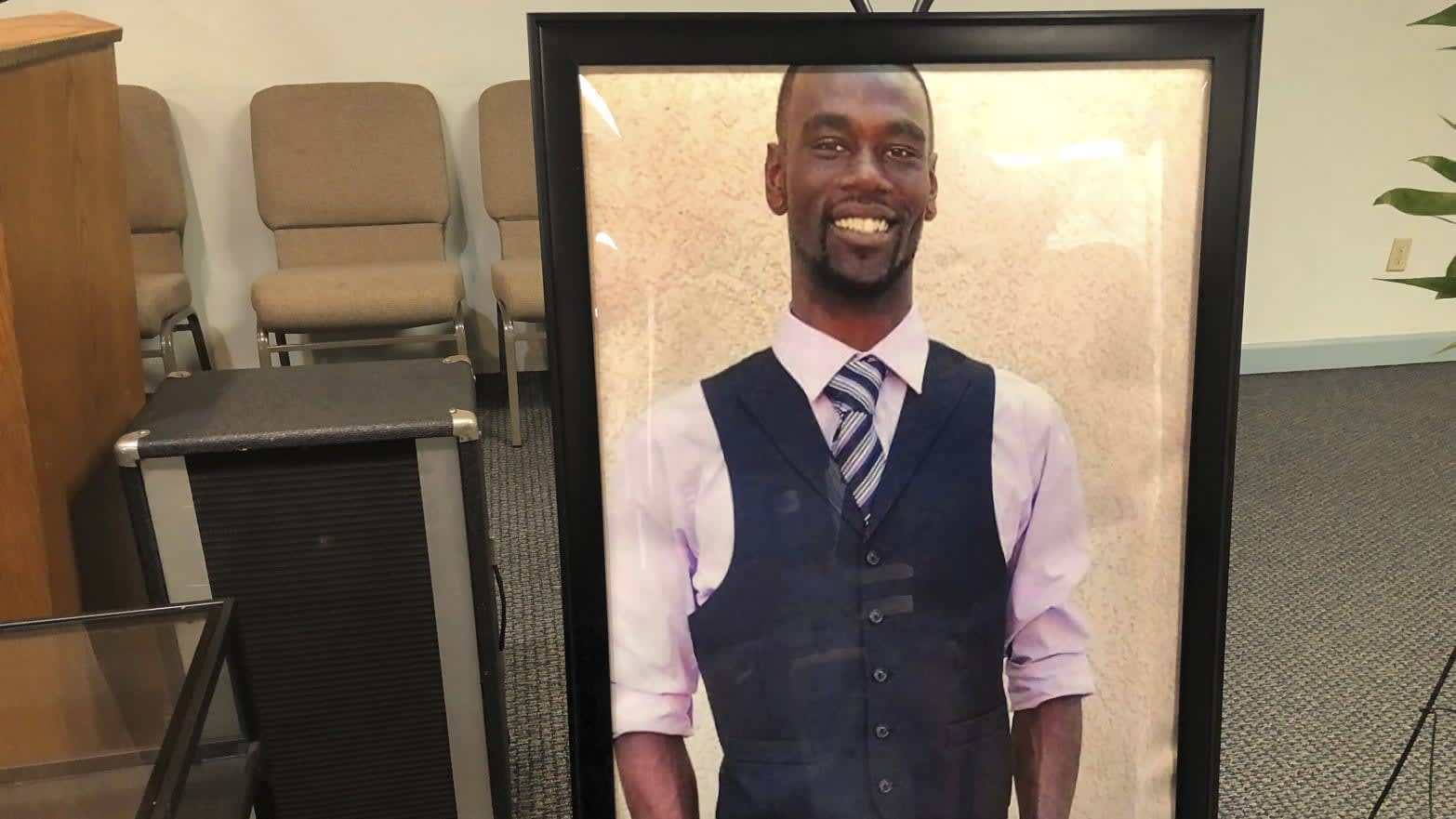 A framed photo of Tyre Nichols