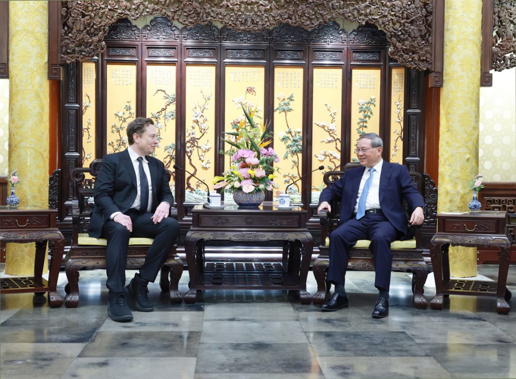 Chinese Premier Li Qiang meets with Elon Musk, CEO of the U.S. electric carmaker Tesla, in Beijing, capital of China, April 28, 2024.