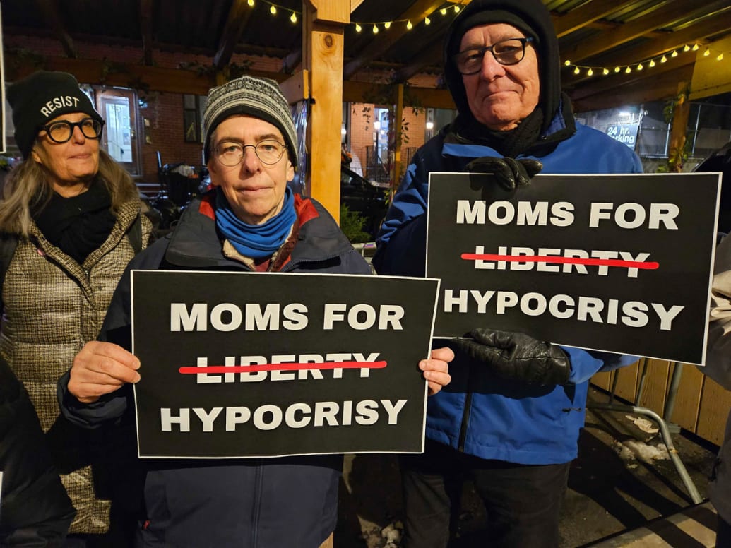 Jamie Bauer, left, at the Moms for Liberty protest.