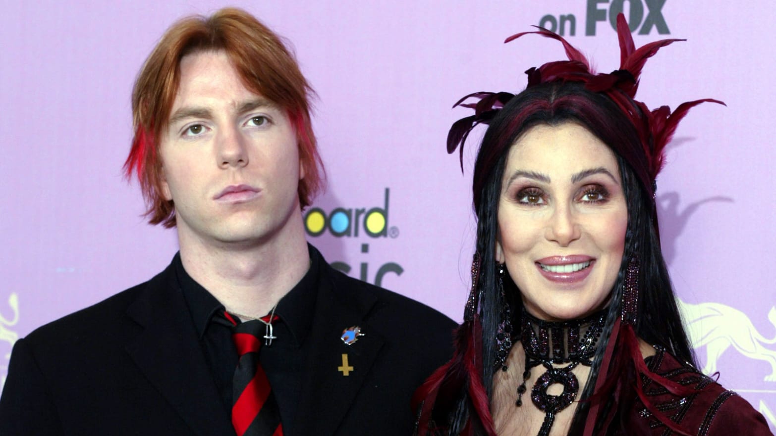 Cher poses with her son, Elijah Blue, at the MGM Grand Garden Arena in Las Vegas, Nevada December 9, 2002