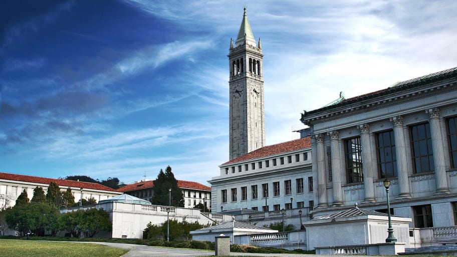 Campus of the UC Berkeley in Berkeley, California. hoto taken on Memorial Glade, showing the Doe Memorial Library as well as Sather Tower (The Campanile) in the background.