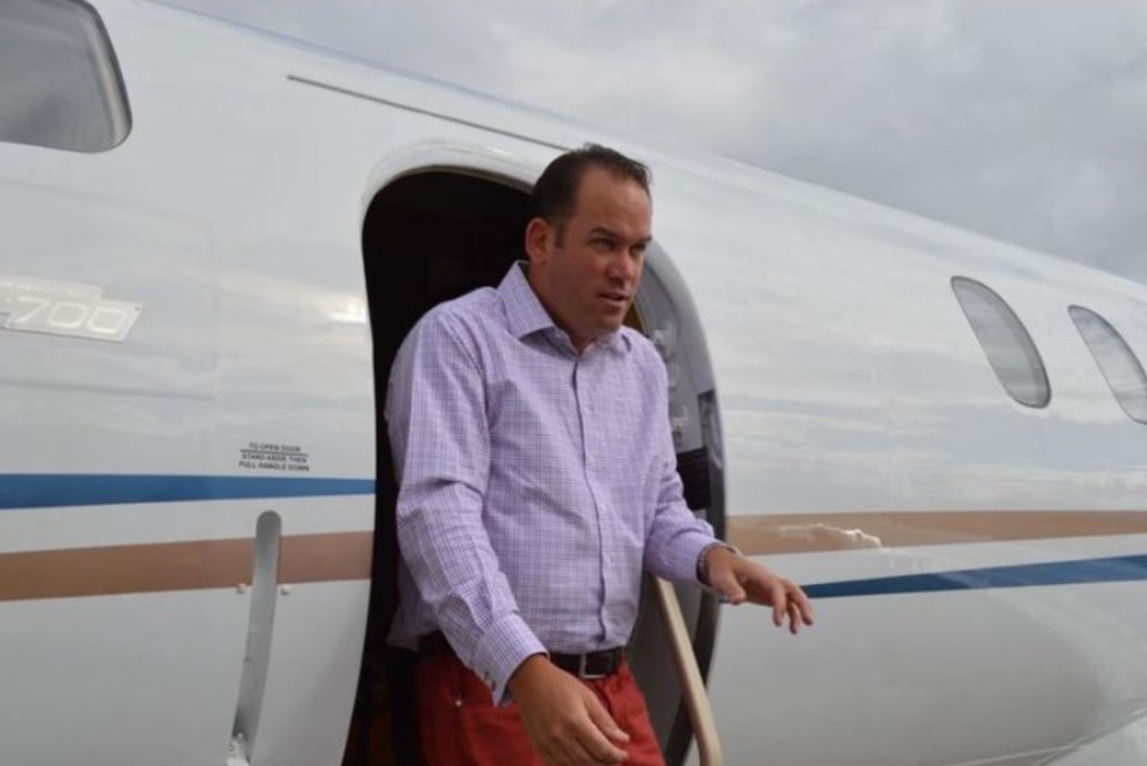 Jason Cardiff disembarking from a private plane.