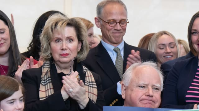 Minnesota Gov. Tim Walz signs a bill to add a fundamental right to abortion access into state law.