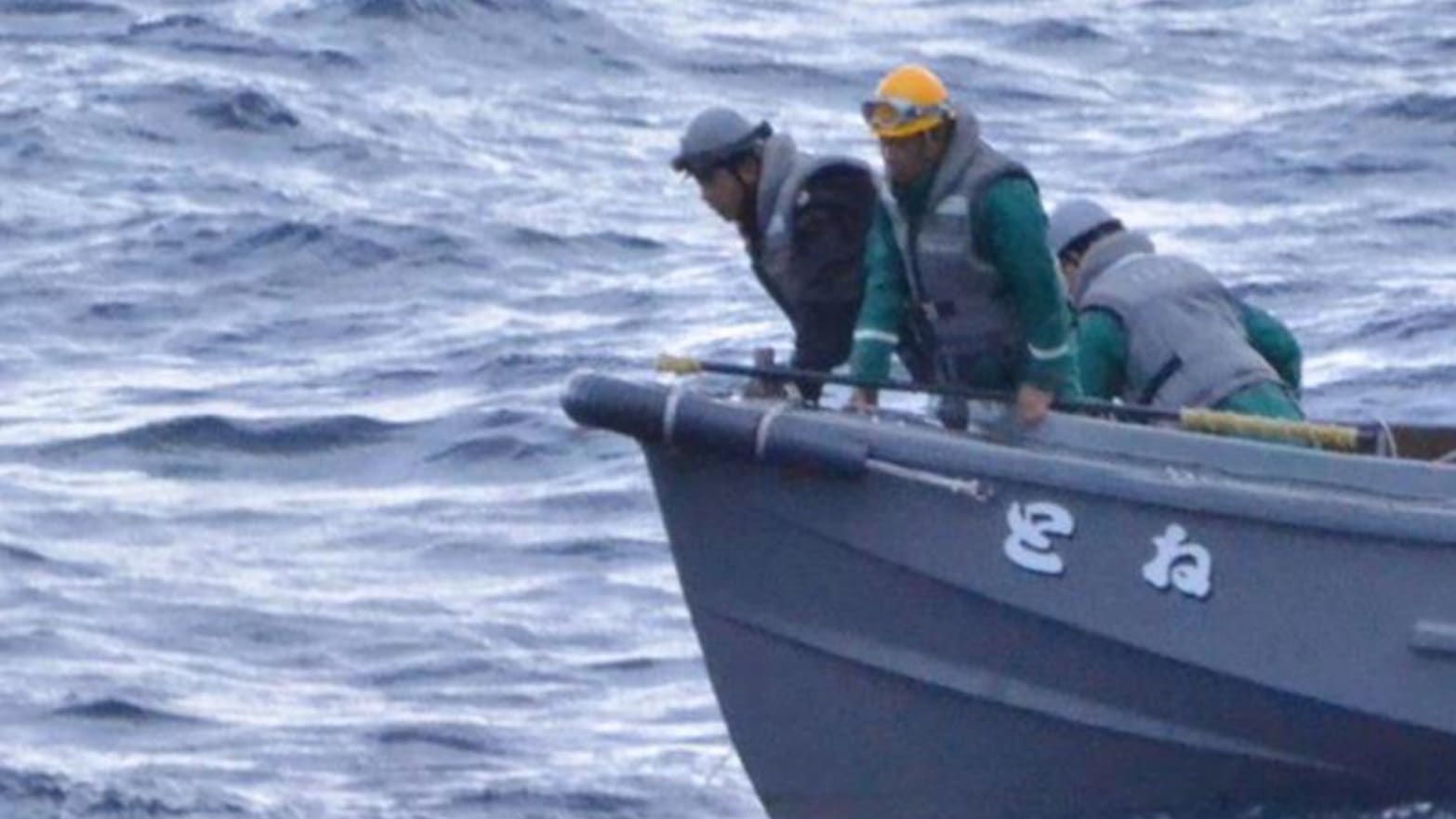 A screen grab captured from a video shows Japan's Maritime Self-Defense Force conducts search operation after US Air Force base Yokota's CV-22 Osprey tilt-rotor aircraft crashed into the sea