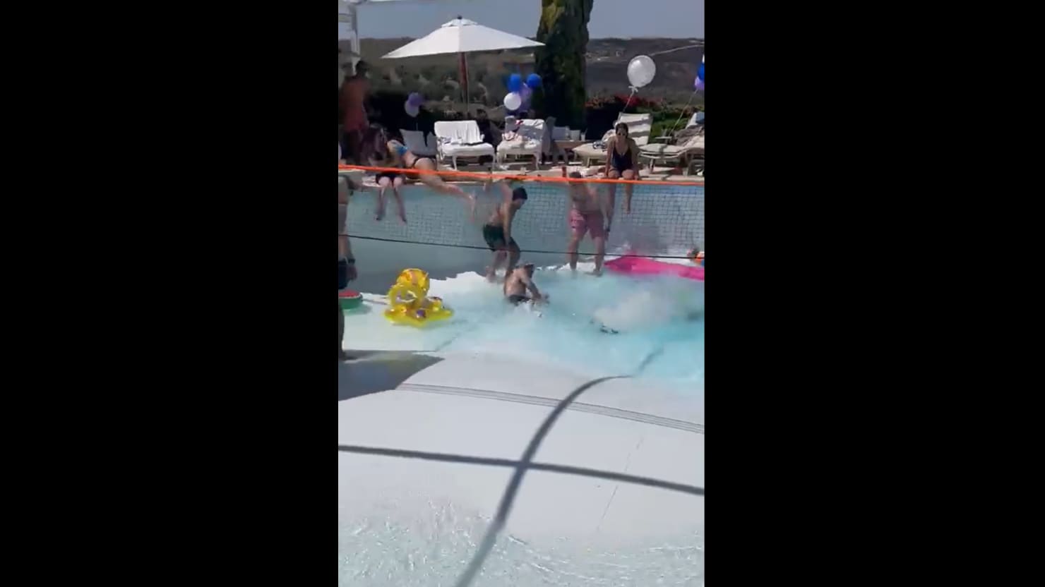 Horrifying Footage Shows Man Being Sucked Into Sinkhole at Pool Party